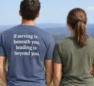 T shirt with slogan "If serving is beneath you, leading is beyond you"